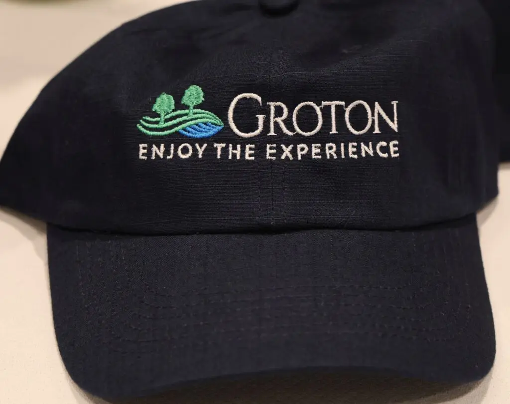 Blue baseball cap with Groton logo.